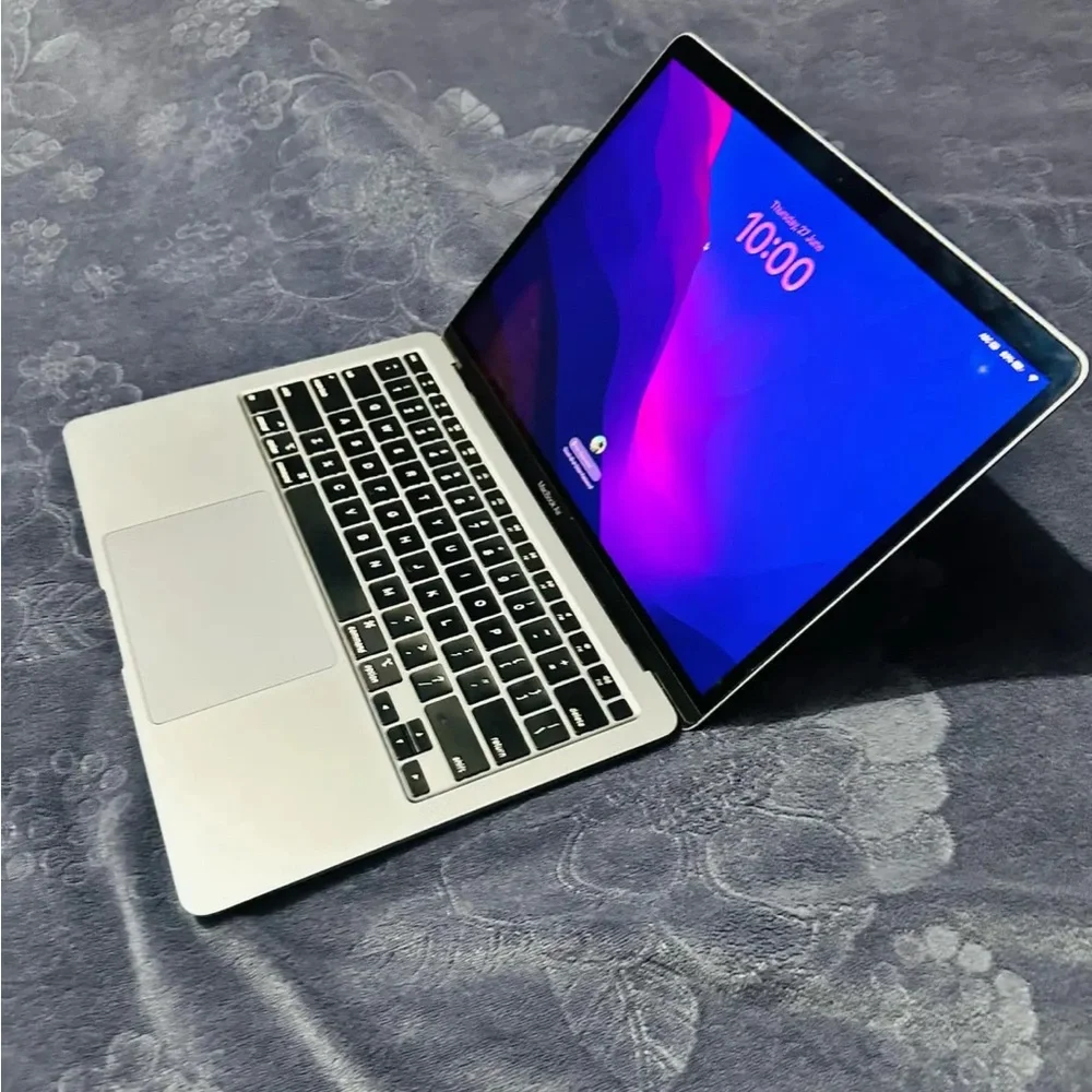 Apple Laptop in Silver with Black Keyboard